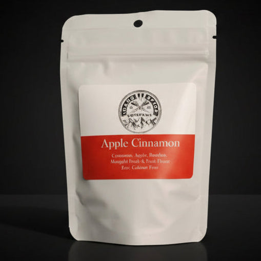 White tea package with 'Apple Cinnamon' flavor label on a dark background