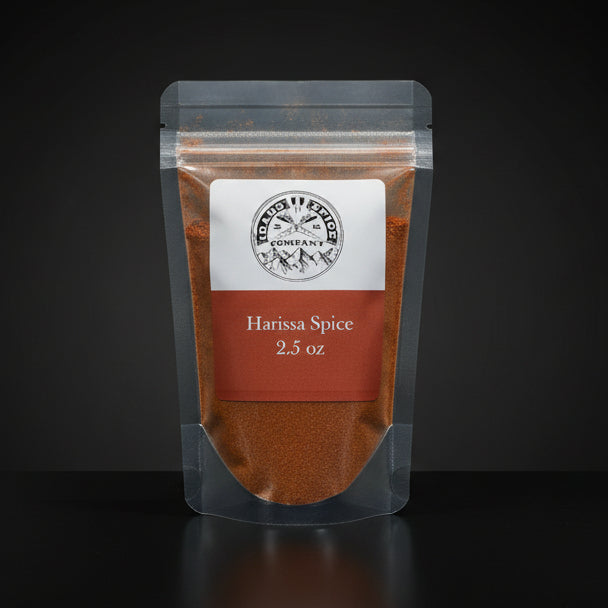Packaged Harissa Spice with a label on a black background