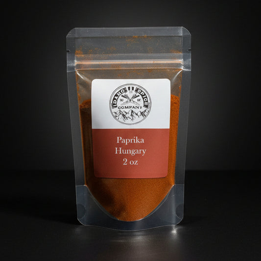 Paprika package with a label on a dark background