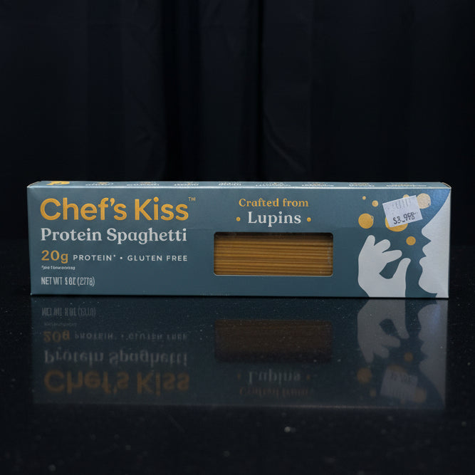 Box of 'Chef's Kiss' product on a wooden surface