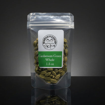 Packaged cardamom green on a black background