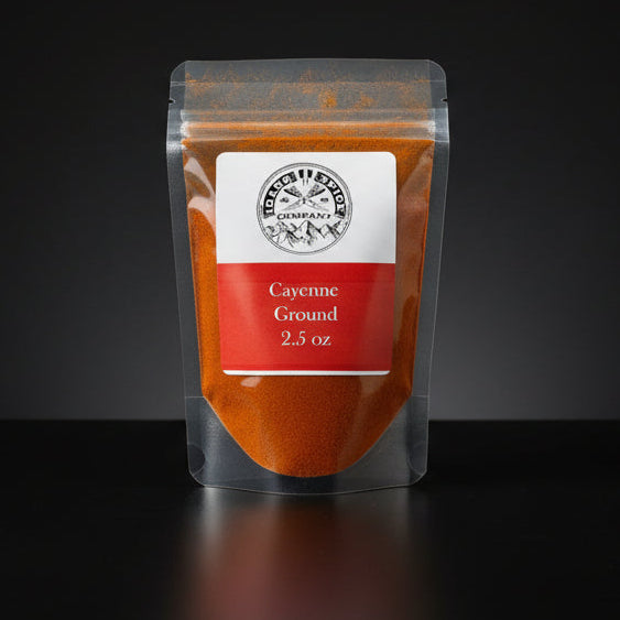 Packaged ground carob on a black background