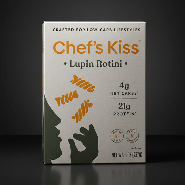 Box of Chef's Kiss Lupin Rotini on a wooden surface