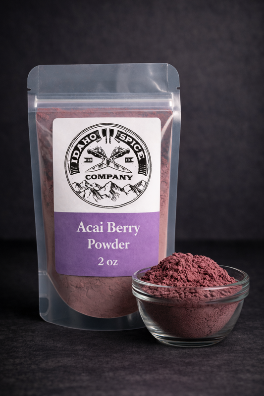 Packaging of Idaho Spice Company Acai Berry Powder with a small bowl of powder on a dark background