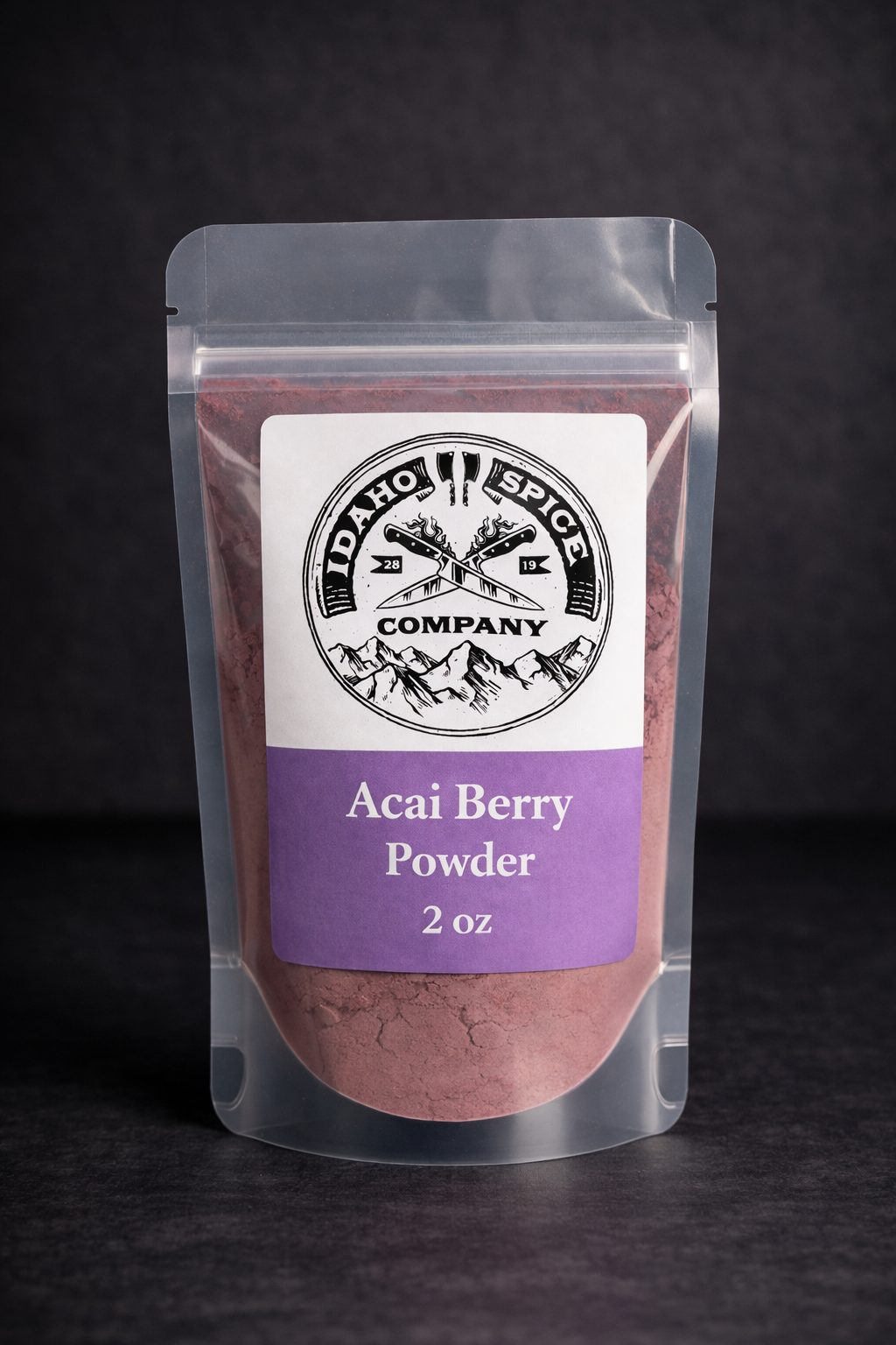 Package of Acai Berry Powder from Idaho Spice Company on a dark background