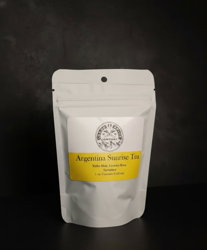 Tea package labeled 'Argentina Sunrise Tea' on a dark background