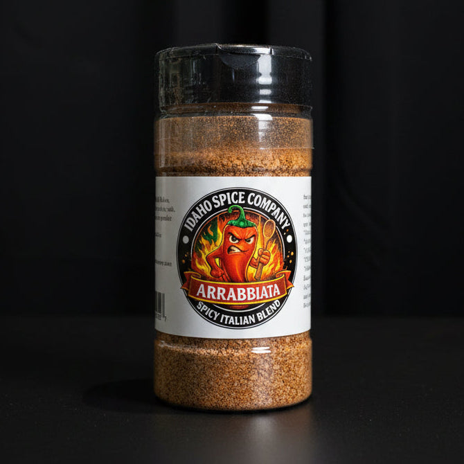 Spice jar labeled 'Idaho Spice Company Arrabiata' on a black background
