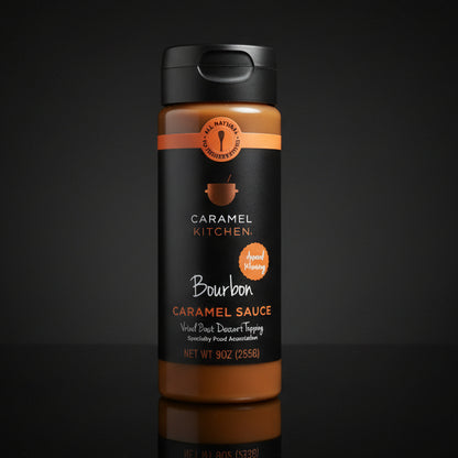 Bottle of Bourbon Caramel Sauce from Caramel Kitchen on a black background