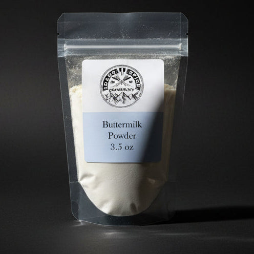 Package of Buttermilk Powder on a black background