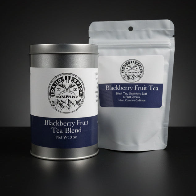Two tea products from the Blackberry Fruit Tea Blend on a black background