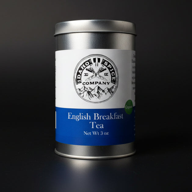 Tin of Idaho Spice Company English Breakfast Tea on a dark background