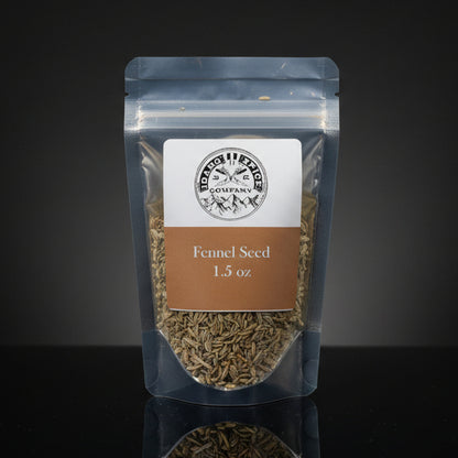 Packaged fennel seeds with a label on a dark background