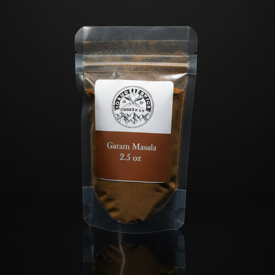 Packaged Garam Masala with a label on a black background