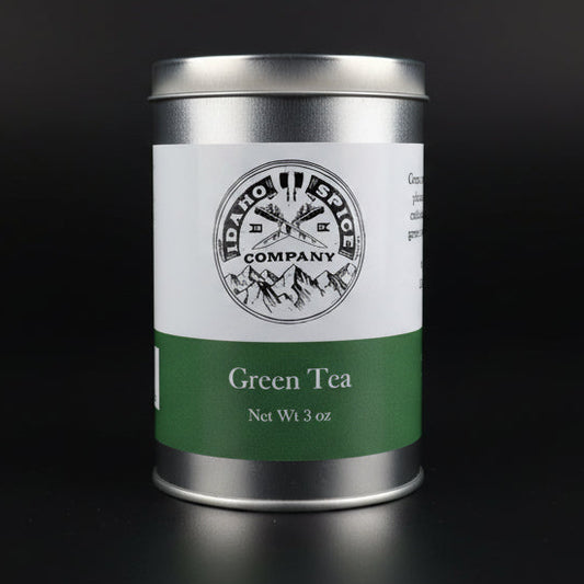 Tea canister with Idaho Spice Company logo on a black background