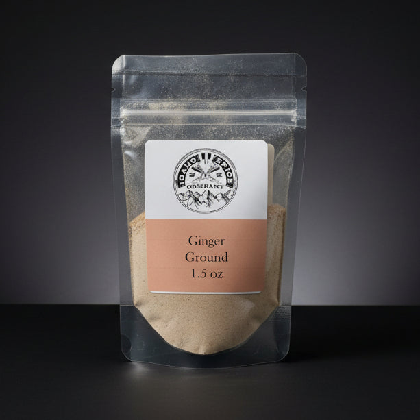 Packaged ginger ground on a dark background with a visible brand label.