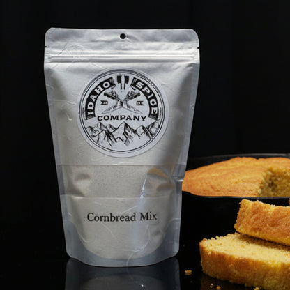 Package of Idaho Spice Company cornbread mix on a black background