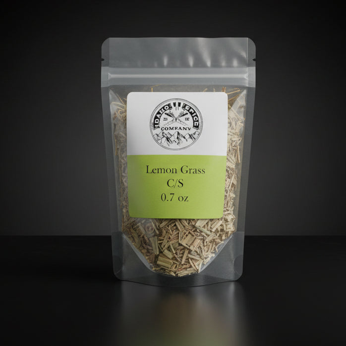 Packaged lemon grass on a black background with a visible brand label.