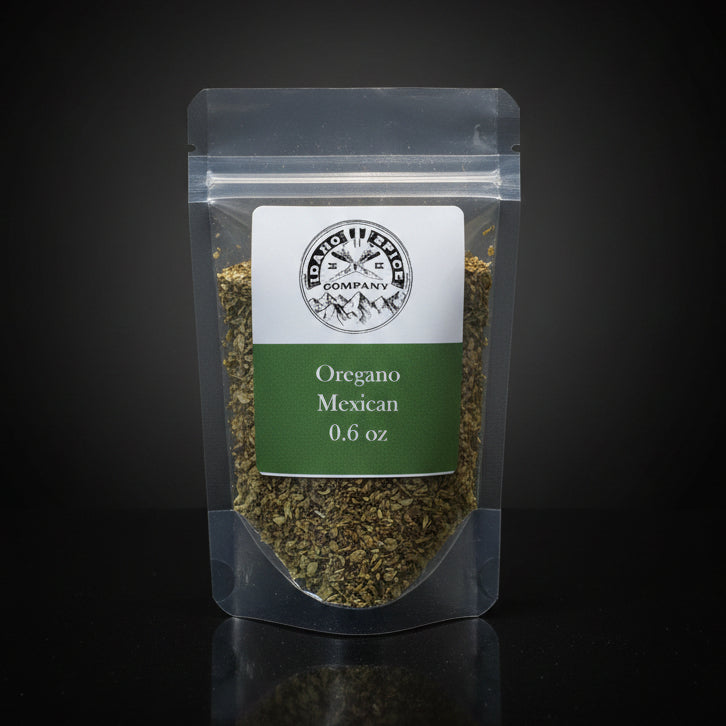 Packaged oregano with a label on a black background