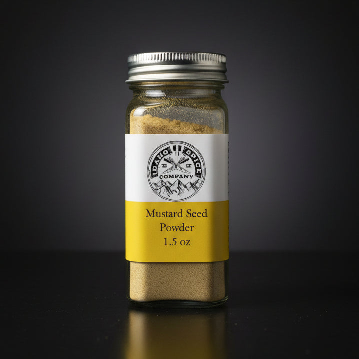 Jar of mustard seed powder with a label on a wooden surface