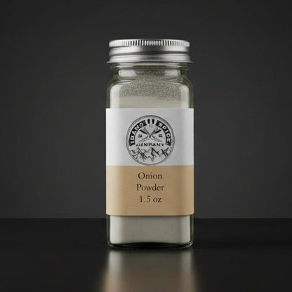 Jar of onion powder with a label on a wooden surface