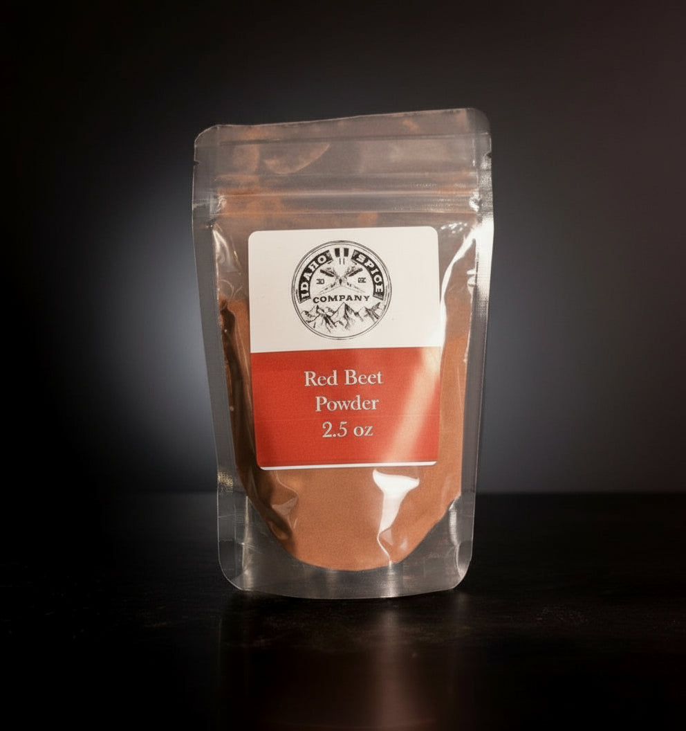 Packaged red beet powder with a label on a black background