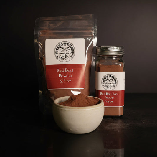 Red Beet Powder packaging with a jar and a bowl of powder on a dark background